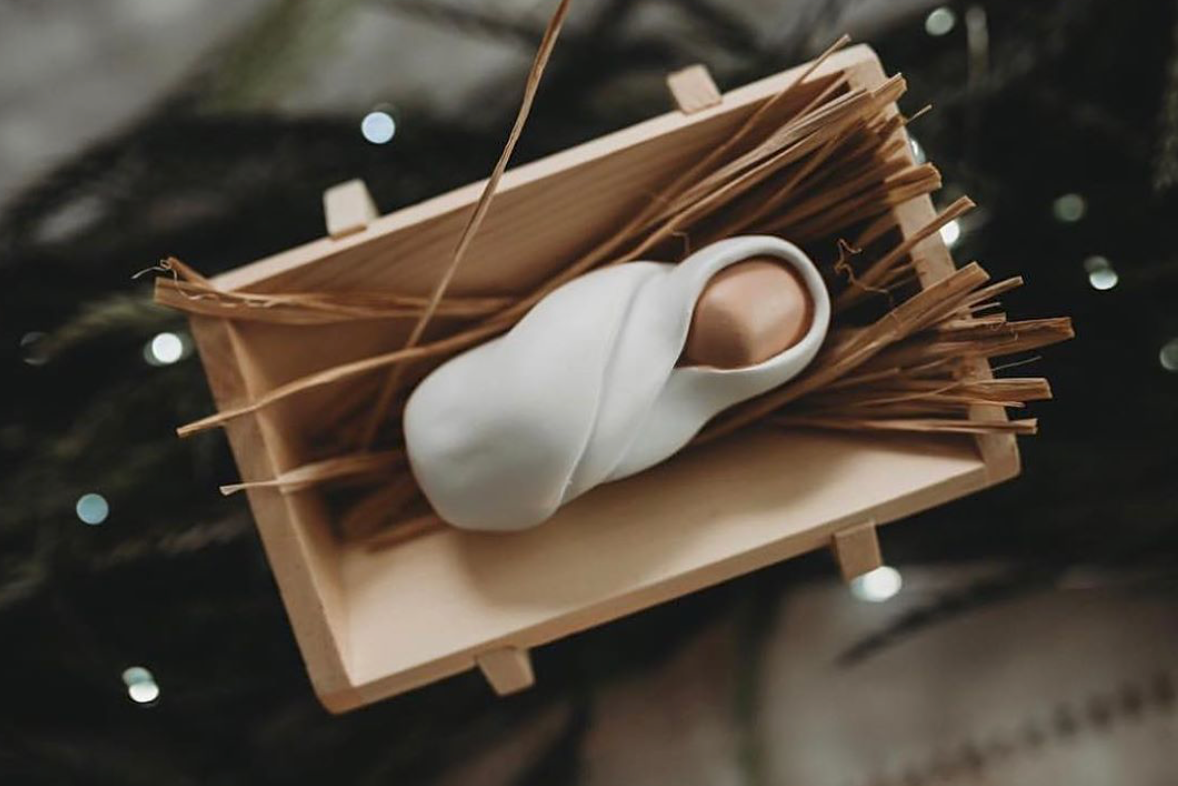 The Reason — The Giving Manger